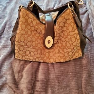 Coach Purse with twist lock latch